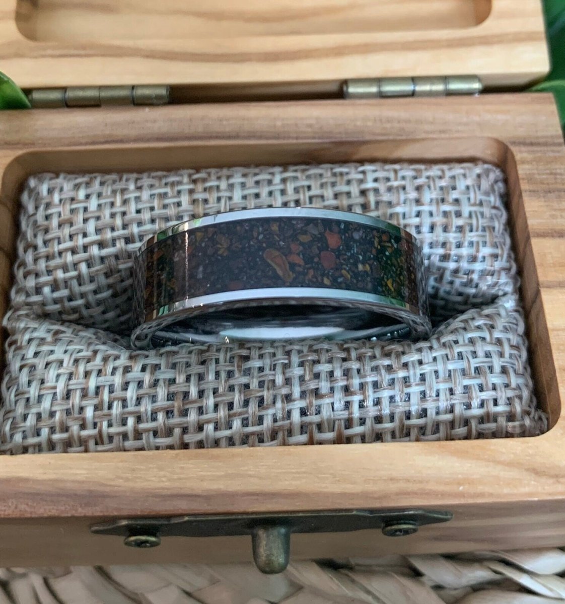 Unique men's dinosaur bone fossil ring with red dinosaur fossil