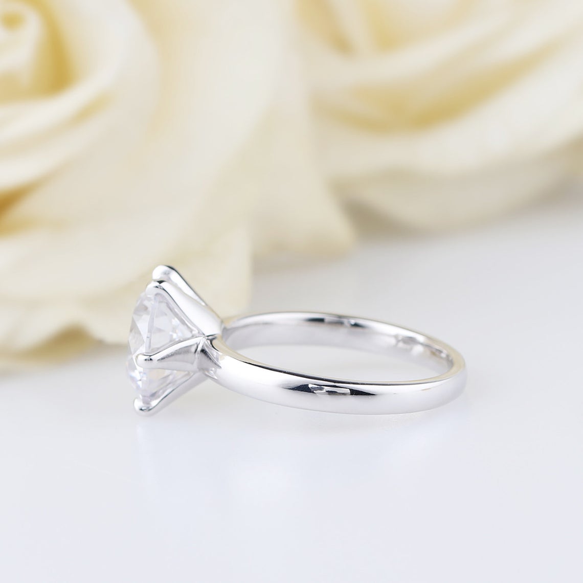 Solitaire moissanite engagement ring
