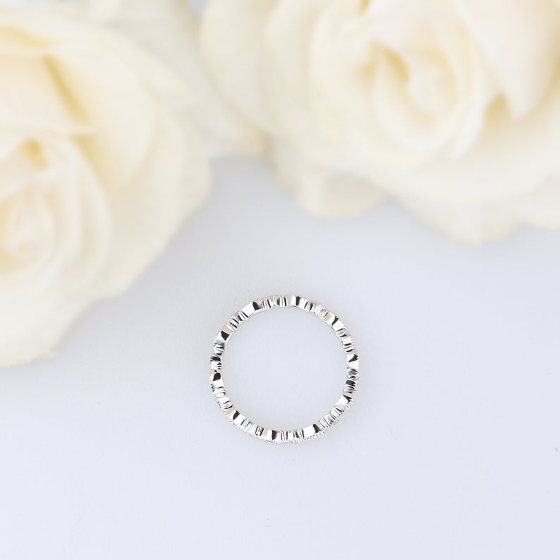 Moissanite eternity wedding band