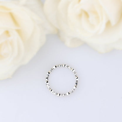 Moissanite eternity wedding band