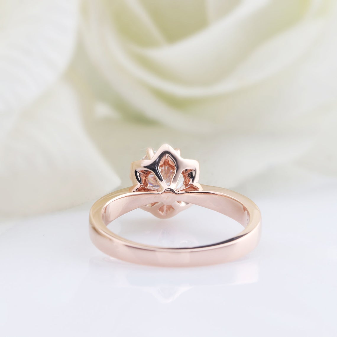 flower moissanite engagement ring