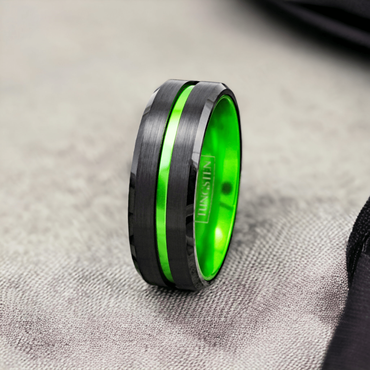 green tungsten ring with black beveled edges